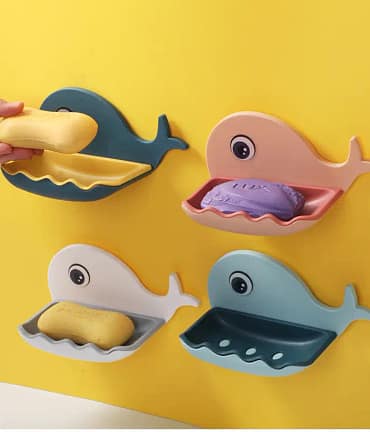 fish-shaped soap holders mounted on the wall