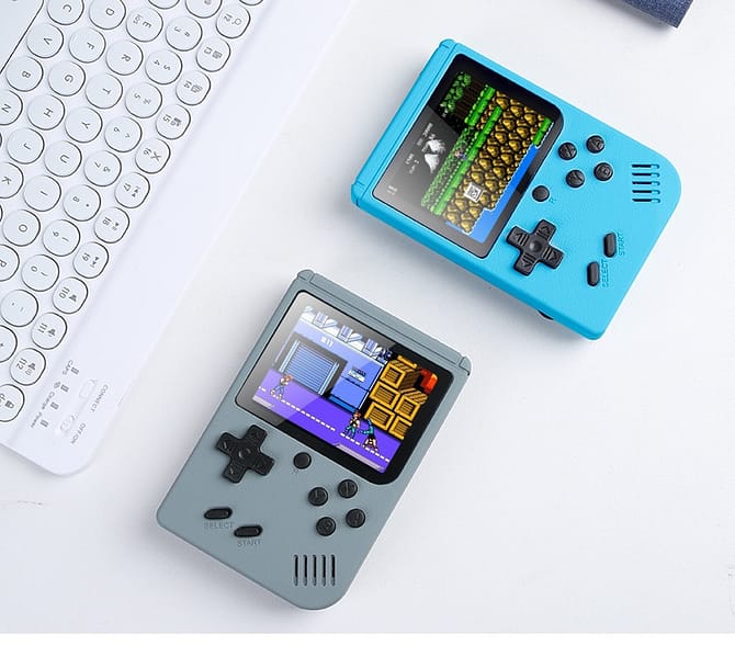 grey and blue handheld retro game consoles