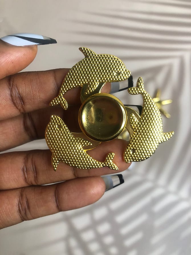 Dolphin-shaped gold fidget spinner